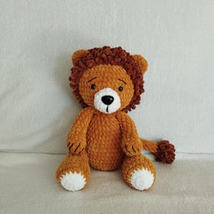 Handmade crocheted lion plush toy in France