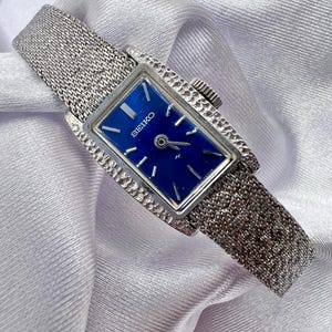 Vintage Womens Silver Seiko Mechanical Wind up Tank Watch Dainty Classy Chic Cocktail blue face with safety chain