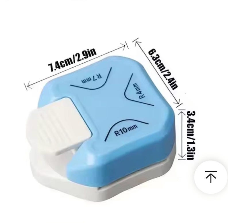 May include: A blue and white corner rounder tool. The tool measures 2.9 inches long, 2.4 inches wide, and 1.3 inches high. It has three corner radius options: R7 mm, R4 mm, and R10 mm. The tool has a white lever for easy operation.