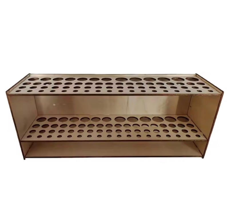 May include: A light brown wooden organizer with multiple circular holes for storage. The organizer has two shelves and a top row of holes. The wood has a natural finish. The organizer is designed to hold various items.