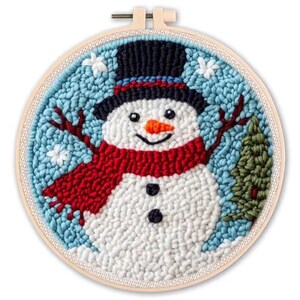May include: A snowman punch needle art piece in a wooden embroidery hoop. The snowman has a black top hat, a red scarf, and a carrot nose. The background is light blue with white snowflakes and a green tree.