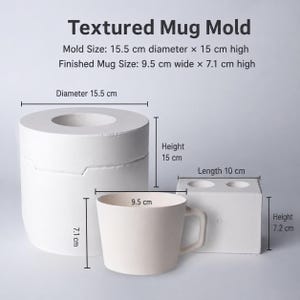 May include: A white textured mug mold and a finished mug. Text reads: Textured Mug Mold. Mold Size: 15.5 cm diameter x 15 cm high. Finished Mug Size: 9.5 cm wide x 7.1 cm high. Dimensions are indicated with lines and labels for the mold and mug.