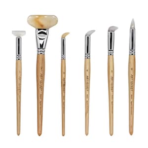 May include: A set of six Art Secret agate burnisher tools with light wood handles and silver metal ferrules. Each tool features a unique stone tip shape, including flat, wide, curved, and pointed designs, numbered one through six on the handles.