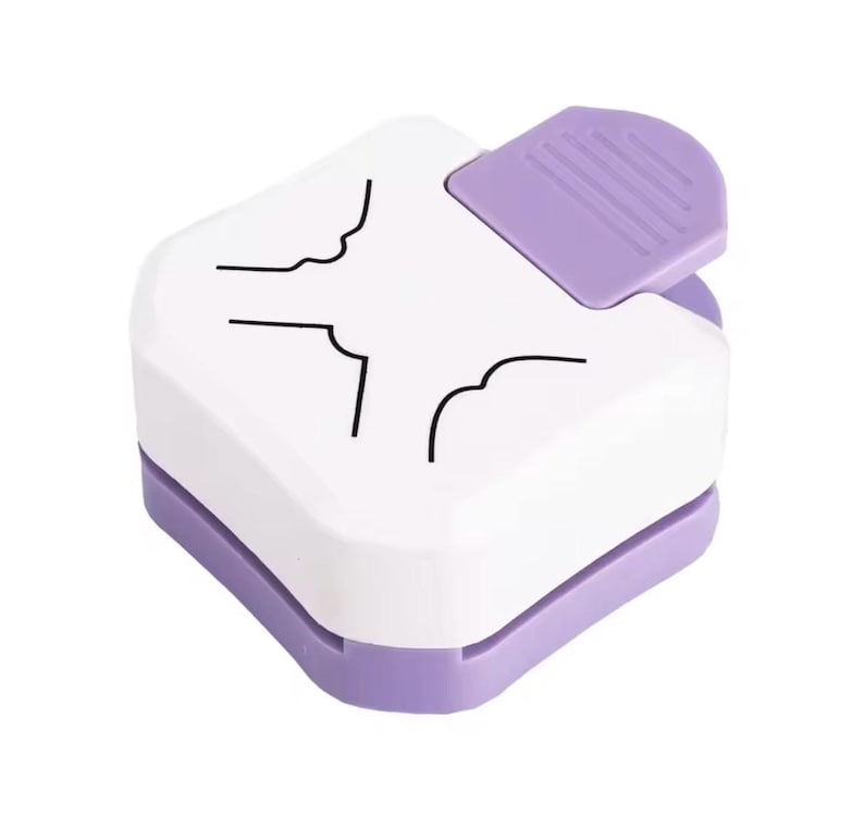 May include: A white and lavender corner paper punch with a lavender lever. The punch has a square shape with rounded corners and black line art. This craft tool is used for paper crafting and scrapbooking.