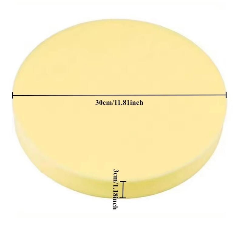 May include: A round, pale yellow cushion. The diameter is 30cm/11.81 inches, and the thickness is 3cm/1.18 inches. The cushion is a solid color and appears to be made of a soft material.