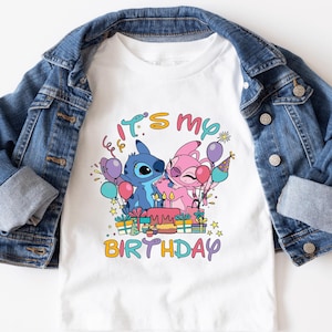 a white t - shirt with a picture of a cartoon character on it