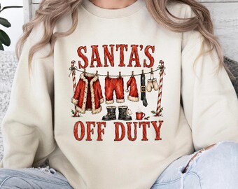 Santa's Off Duty Christmas Graphic Apparel, Funny Santa Clothesline Holiday Shirt, Retro T-Shirt and Sweatshirt