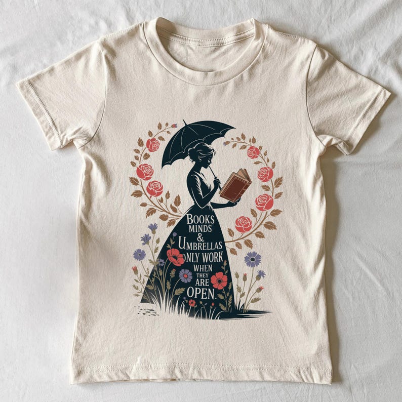 a t - shirt with an image of a woman holding an umbrella