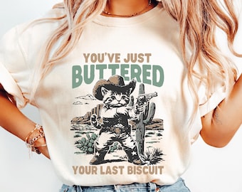 Funny Cowboy Cat Graphic Tee: Desert Rodeo Humor Shirt