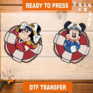 May include: Two iron-on transfers featuring Mickey Mouse in a sailor outfit and a captain's hat. The transfers are ready to press and are perfect for creating custom apparel or accessories.  The transfers are in the shape of a life preserver.