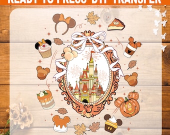 May include: A DTF transfer sheet with a fall-themed design. The design includes a castle, pumpkins, cupcakes, and Mickey Mouse-themed elements. The text "READY TO PRESS DTF TRANSFER" is at the top.