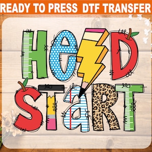 May include: A colorful DTF transfer design with the words "HEAD START" in a playful font. The letters are decorated with patterns like polka dots, stripes, and leopard print, and a pencil and apple are incorporated into the design.