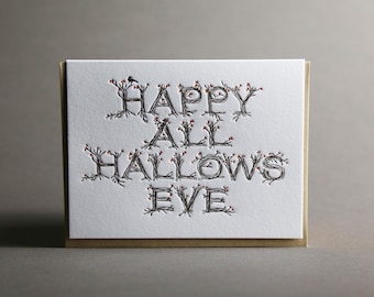 Tarjeta de felicitación de Halloween con tipografía feliz de Todos los Santos