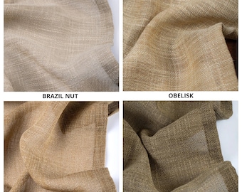 May include: Close-up of four fabric swatches in different shades of brown. The swatches are labeled "Sunwashed", "Fantan", "Brazil Nut", and "Obelisk".
