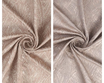 May include: Two fabric swatches in a light brown color with a subtle shimmer. The fabric has a woven pattern with a subtle leaf design. The swatches are labeled "Narin" and "Sevda".