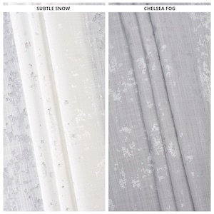 May include: Two fabric swatches, one white with a subtle snow pattern and one grey with a Chelsea Fog pattern.