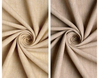 May include: Two fabric swatches, one in a light beige color called "Sunstone" and the other in a darker beige color called "Moccasin". Both swatches are folded and twisted to show the texture of the fabric.