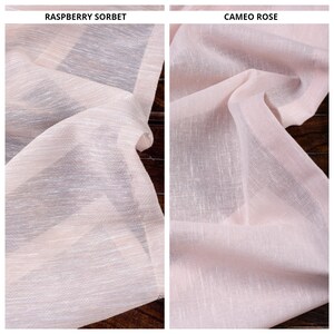 May include: Close-up of two sheer fabric swatches in pink hues. The swatch on the left is labeled "Raspberry Sorbet" and the swatch on the right is labeled "Cameo Rose".