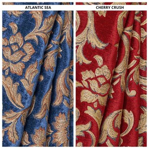 May include: Two fabric swatches with a gold floral pattern. The fabric on the left is a blue color called "Atlantic Sea". The fabric on the right is a red color called "Cherry Crush".