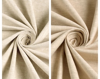 May include: Close-up of two fabric swatches in a beige color. The fabric is textured and has a subtle sheen. The swatches are labeled "Golden Glaze" and "Picnic Basket".