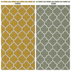 May include: Two fabric swatches with a geometric pattern. The swatch on the left is a mustard yellow color with a white pattern. The swatch on the right is a light gray color with a white pattern. The text "CURIO" is above the left swatch and the text "ALBA" is above the right swatch.
