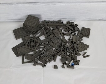 Assorted Charcoal Gray Lego Bricks and Accessories