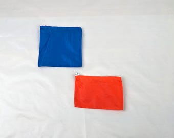 Waterbestendige zakjes met ritssluiting: nylon parachute, marineblauw en oranje
