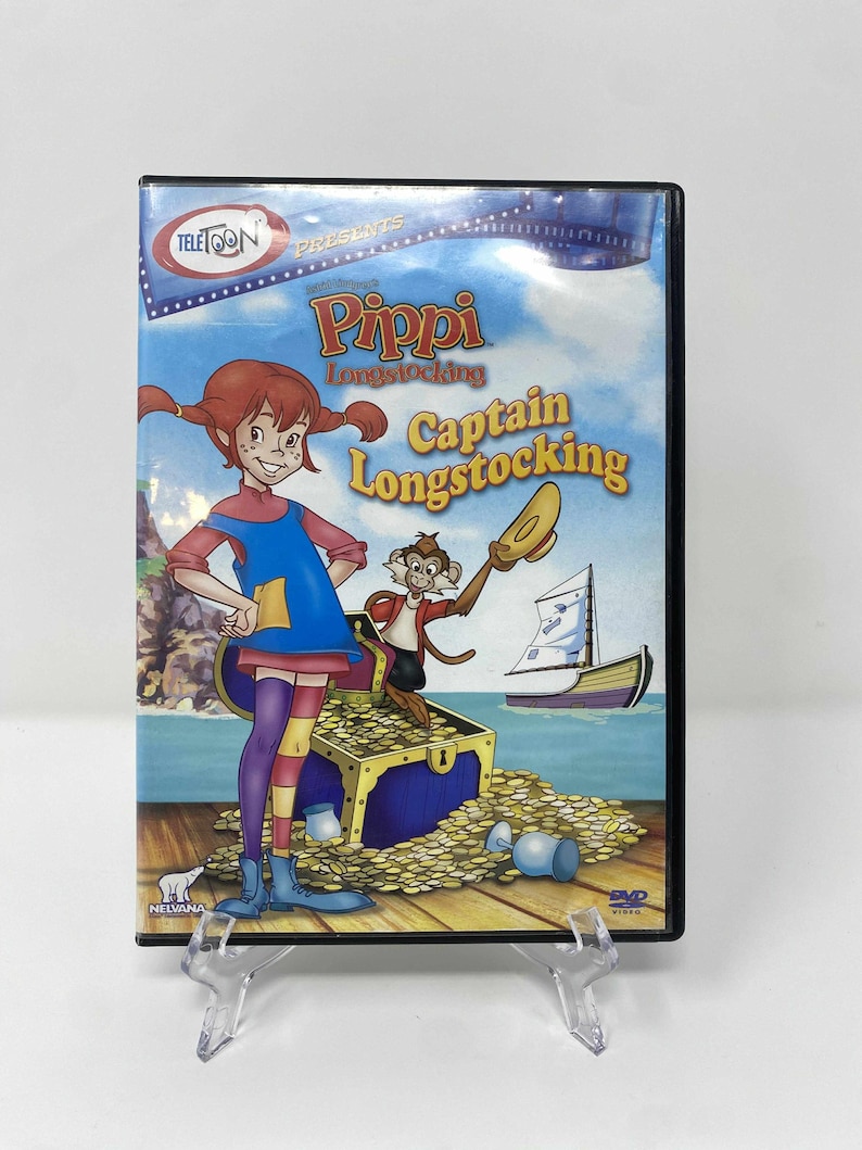 May include: DVD of the animated film "Pippi Longstocking: Captain Longstocking." The cover features Pippi with red pigtails, a monkey, a treasure chest, and a sailboat. The DVD case is in a clear plastic holder.