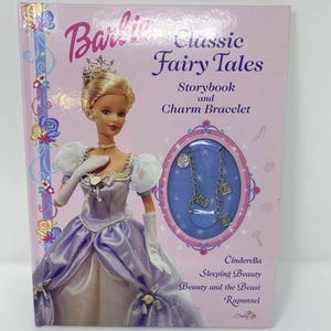 May include: A Barbie "Classic Fairy Tales" storybook with a charm bracelet. The cover features a Barbie doll in a purple gown and the titles of the fairy tales: Cinderella, Sleeping Beauty, Beauty and the Beast, and Rapunzel.