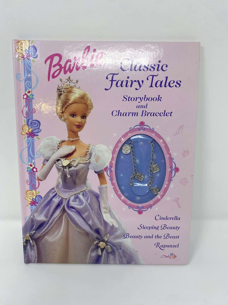 May include: A Barbie "Classic Fairy Tales" storybook with a charm bracelet. The cover features a Barbie doll in a purple gown and the titles of the fairy tales: Cinderella, Sleeping Beauty, Beauty and the Beast, and Rapunzel.