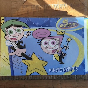 Vintage photo Album Y2K "fairy odds parents" 2004