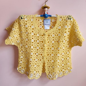 May include: A set of three ceramic nesting bowls in shades of blue, green, and white. The bowls feature a speckled glaze and a simple, modern design. The largest bowl measures approximately 6 inches in diameter.