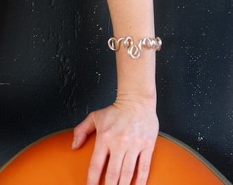 Artisan Sterling Silver Cuff Bracelet: Sculptural 'Loopy' Design