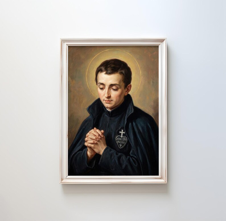 May include: A framed portrait of a man with a halo, dressed in a black cloak and jacket, with clasped hands. The portrait has a warm color palette with a gold halo and a white frame. The image features a religious theme.