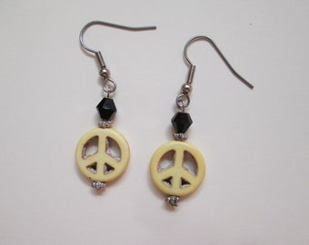 Yellow peace sign and black crystal earrings