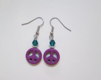 Purple peace sign earring with blue-green crystal