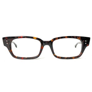 May include: Rectangular eyeglasses with a tortoiseshell pattern. The frames have rounded edges and small rivets on the outer corners. The lenses are clear, and the temples are thin and dark.