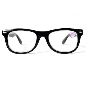 May include: Black-framed spectacles with clear lenses. The glasses have a classic, rectangular shape with a thick frame and temples. A small, purple sticker with the word "ASPHERIC" is on the right lens.