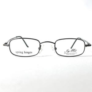 May include: Black rectangular eyeglasses with thin frames. The glasses have the text "spring hinges" on the left lens and "Jay Rob Fifth Avenue" on the right lens. The glasses are set against a white background.