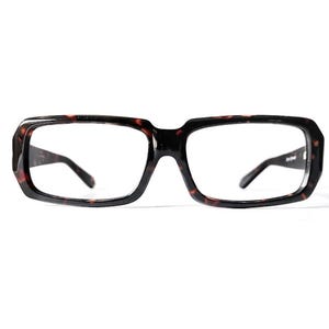 May include: Rectangular eyeglasses featuring a dark brown and black tortoiseshell pattern frame. The glasses have clear lenses and thin, matching tortoiseshell temples that extend from the outer corners of the frame front.