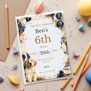 Watercolor puppy invitation flat lay with colored pencils and paint palette, creative party planning scene