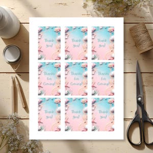 May include: A sheet of nine invitation cards with a beach theme. Each card has a blue and pink background with seashells and the text "Thank You!" or "Thanks for Coming!". The cards are surrounded by decorative elements.