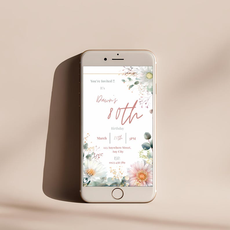 80th birthday invitation template displayed on mobile phone screen, editable Canva floral invitation for garden party celebration