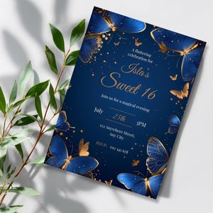 Close-up view of royal blue and gold butterfly Sweet 16 invitation details