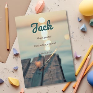 Matching “Ofishally One” thank you card design displayed on a flat surface featuring coordinated fishing-themed coastal style and soft pastel colors.