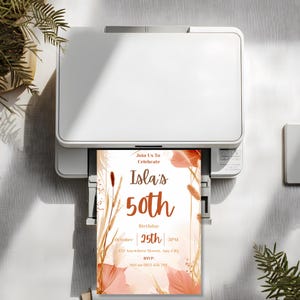Boho 50th birthday invitation printing from a home printer, showing easy at-home printing