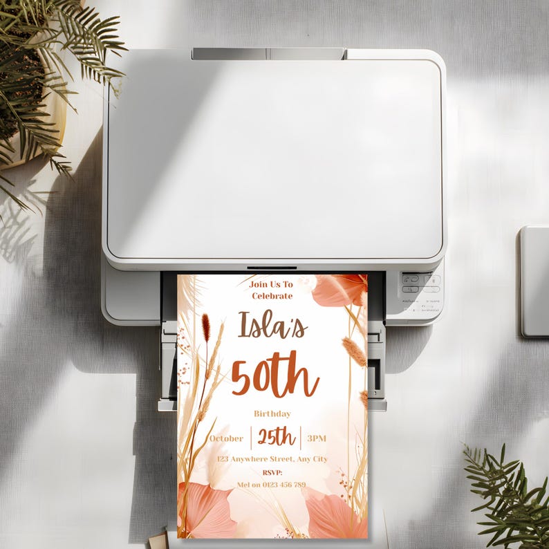 Boho 50th birthday invitation printing from a home printer, showing easy at-home printing