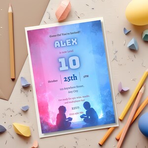 Gamer birthday invitation on a craft desk with envelope and stationery, editable neon Level Up party invite template