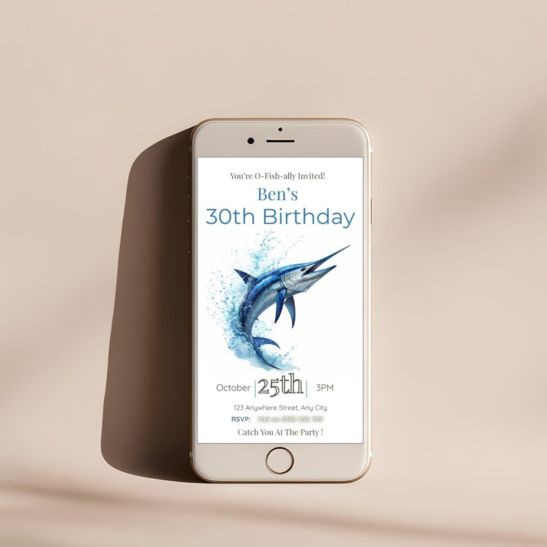 Fishing birthday invitation displayed on mobile phone, editable Canva invite with blue marlin ocean theme.