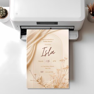 Neutral beige and cream bridal shower invitation featuring delicate florals, 5x7 printable Canva design